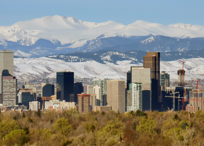 Denver, Colorado skyline with mountains in the background
