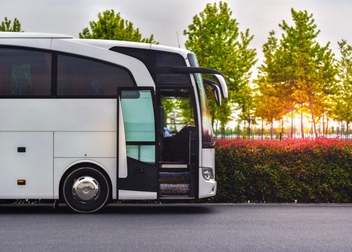 Luxury bus waiting for passengers in parking lot