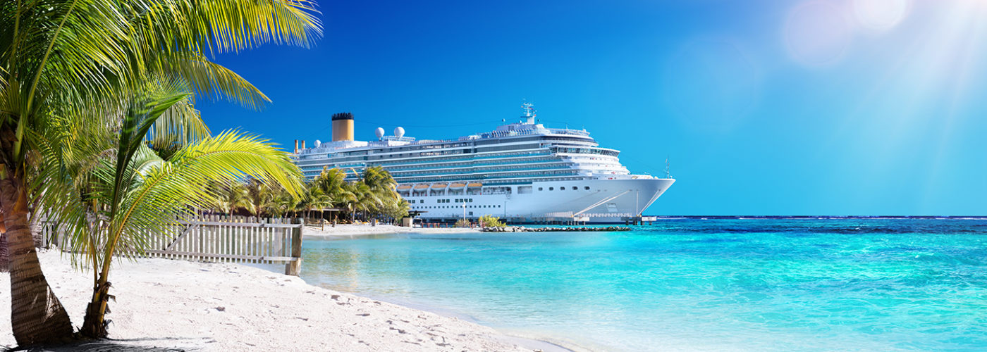 Cruise ship on tropical island