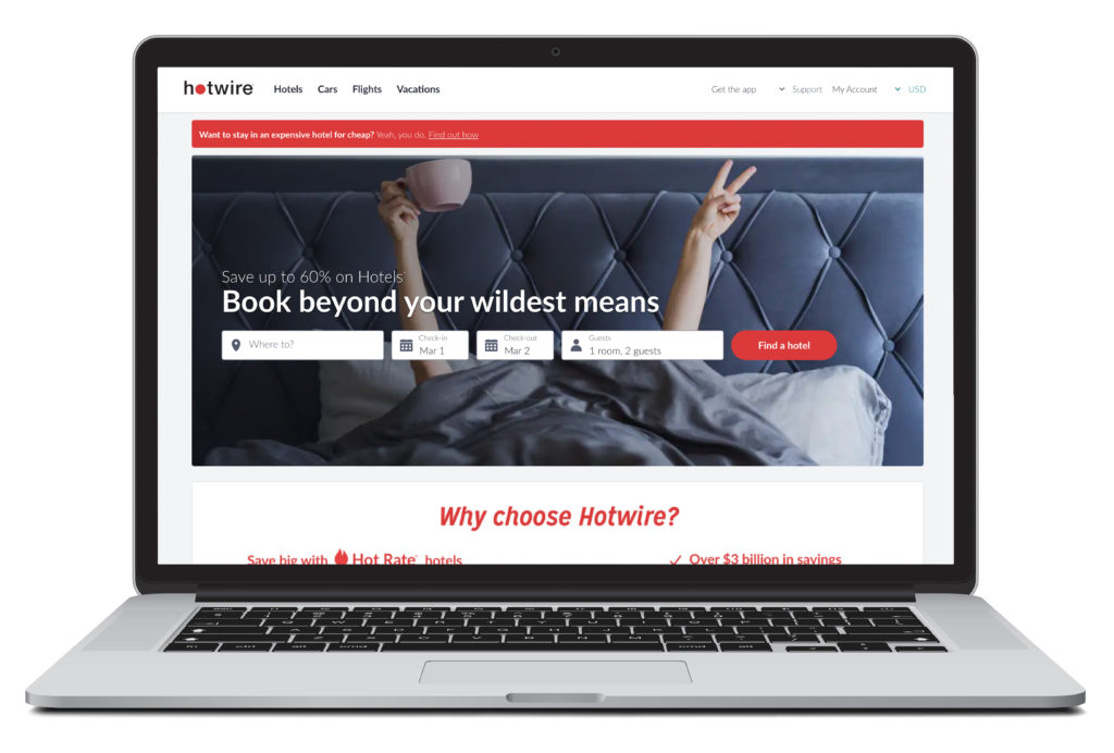 Open laptop showing home screen of Hotwire, a hotel bookings site