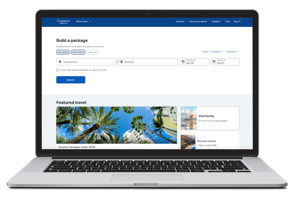 Laptop showing homepage of Travelocity vacation packages booking site